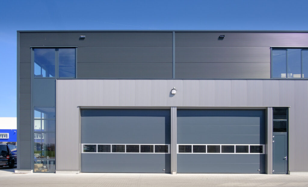 Sectional Door - Southern Industrial Doors Commercial, Auto and Pedestrian Doors installation, maintenance, repair roller shutter curtain Eastleigh Hampshire, Southampton, Portsmouth, Winchester, Havant, Bournemouth, Dorset, Salisbury